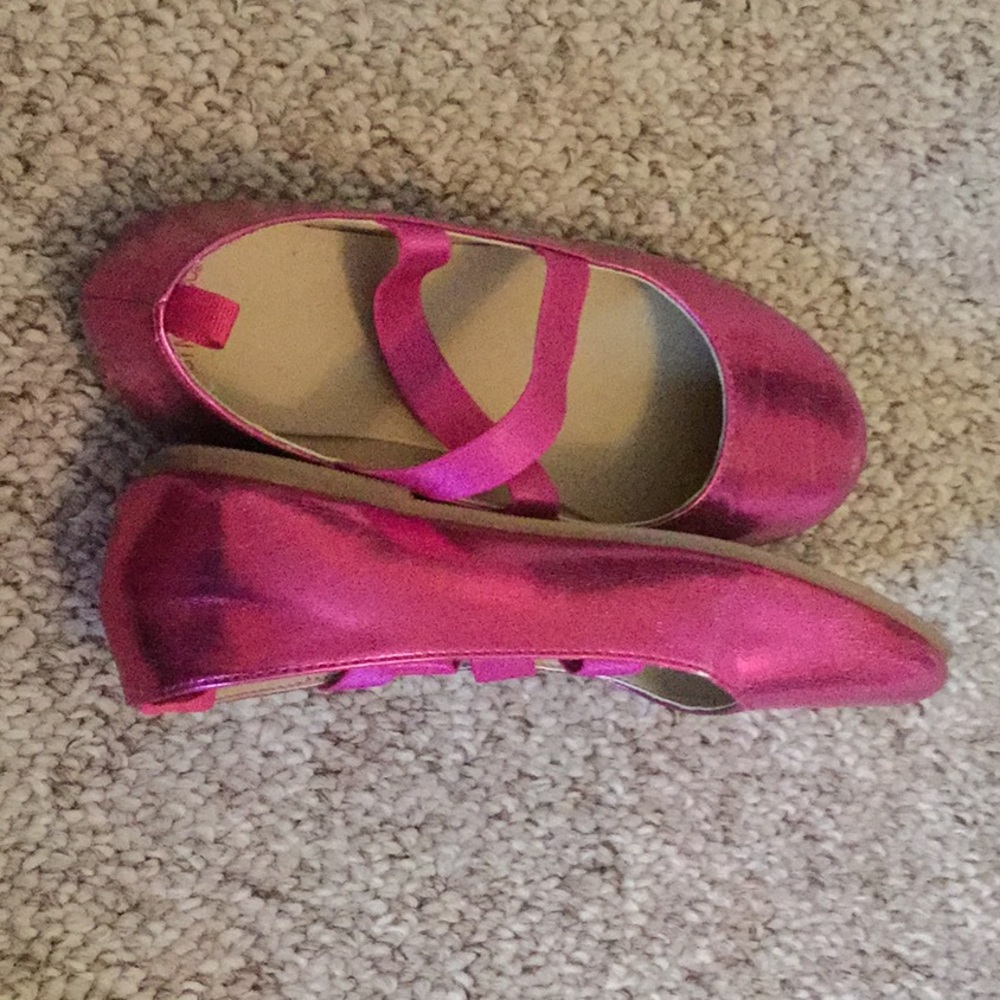 A cute little girls shoes.